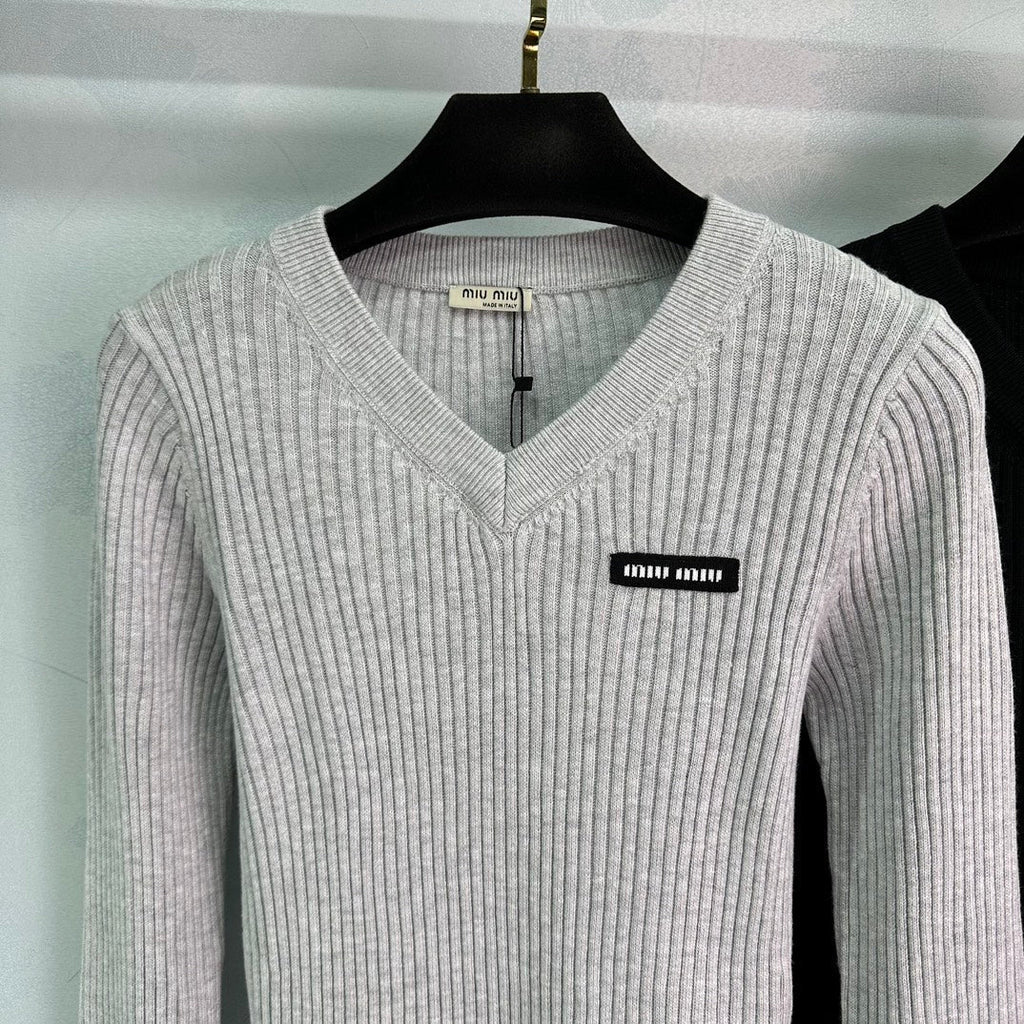 Ribbed High-Neck Wool Sweater