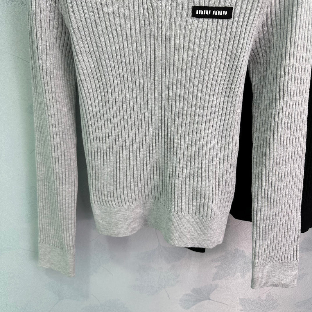 Ribbed High-Neck Wool Sweater